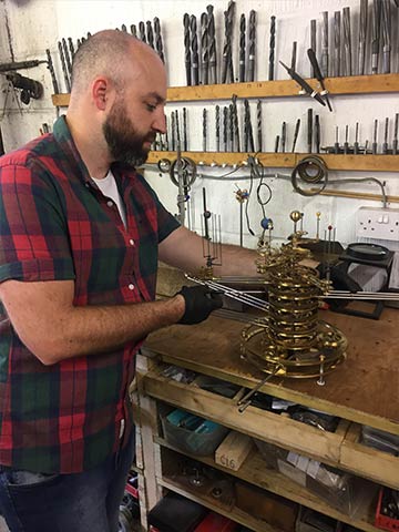 Adjusting gear train of a Genesis Orrery