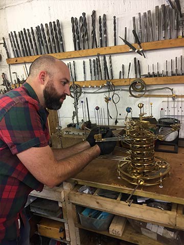 Adjusting gear train of a Genesis Orrery