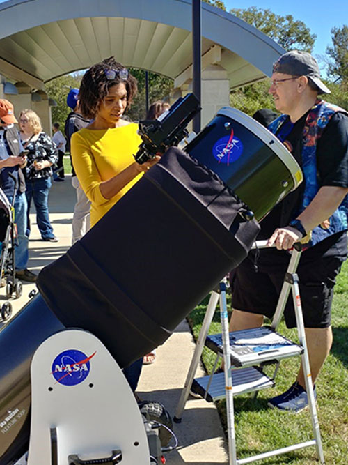 Tom Campbell in discussion with participant