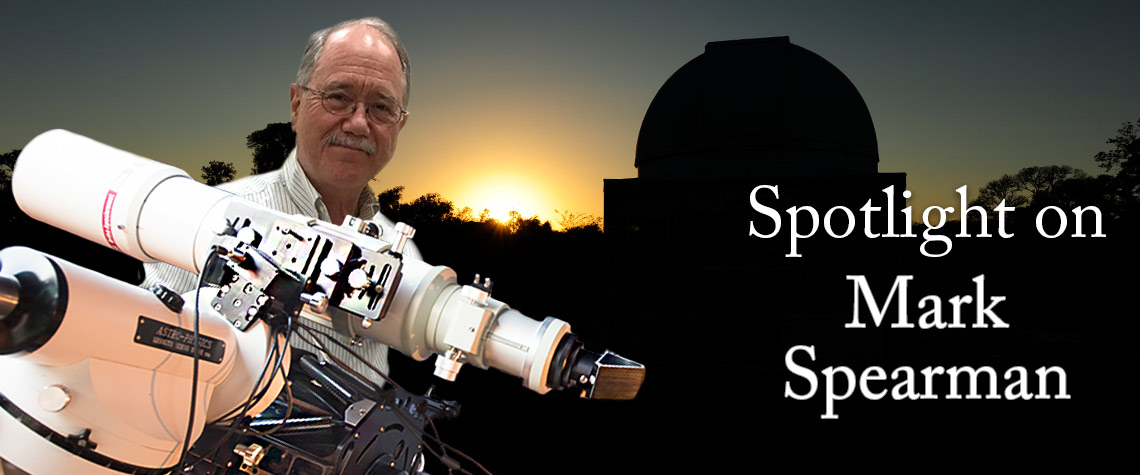 Mark Spearman holding volunteer award with his observatory in the background