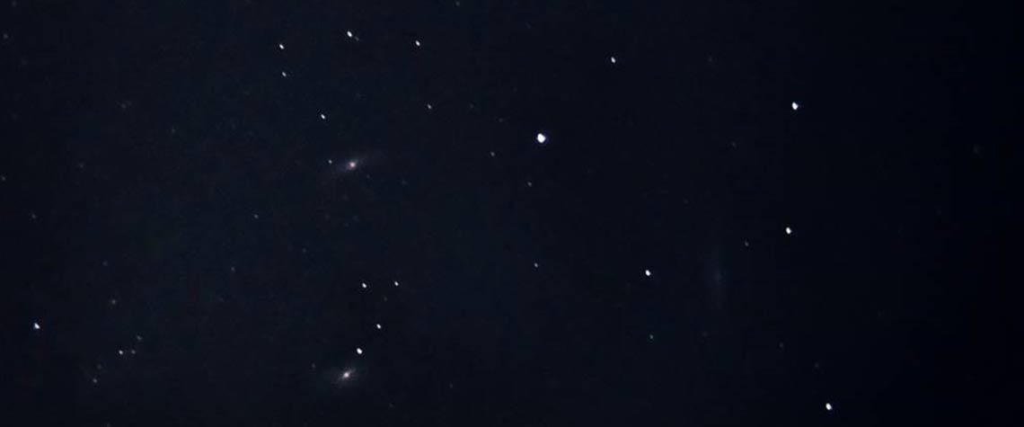 smart phone mounted on a telescope