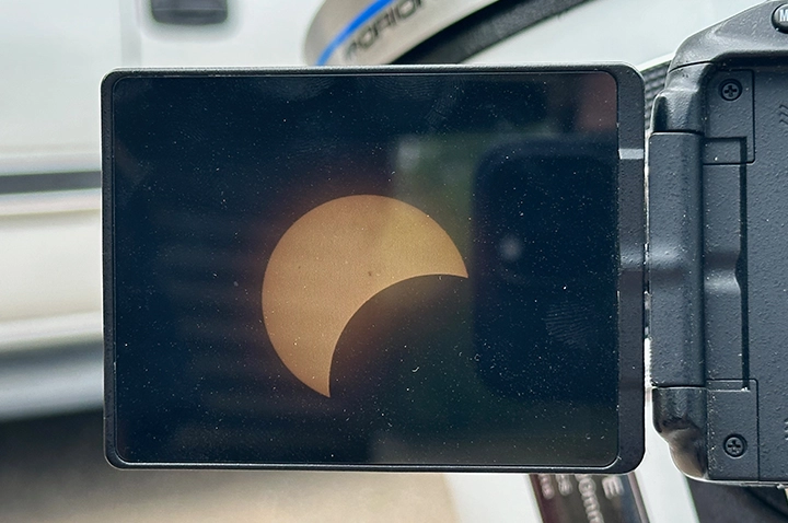 Partial eclipse captured on camera screen