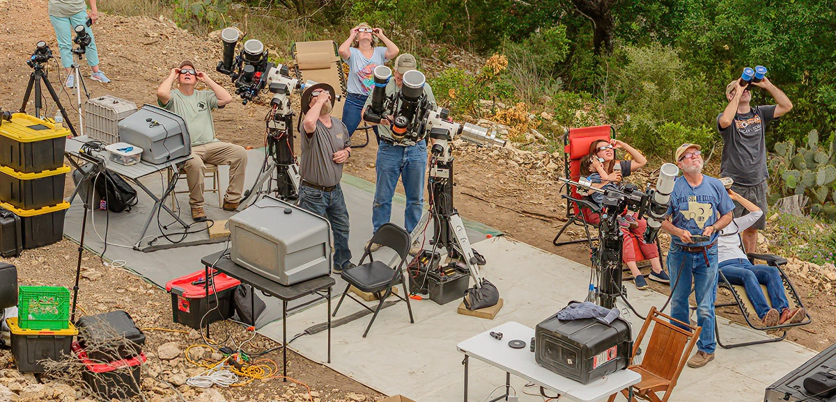 families watching the 2024 solar eclipse