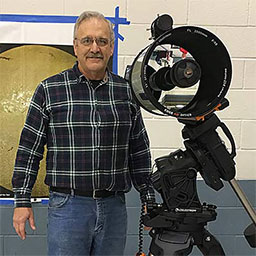 Warren Bracewell with telescope